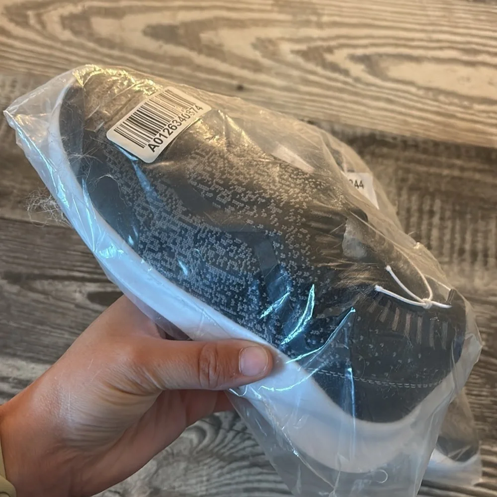 Brand New Kids Slip On black and grey sneakers.